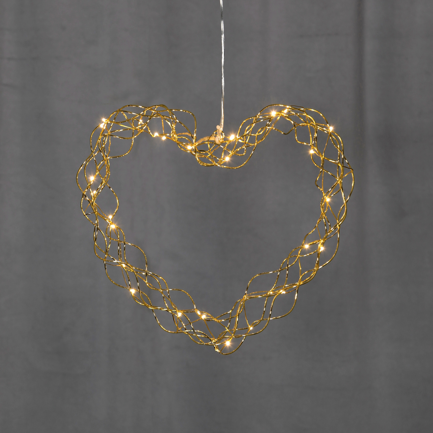 LED Licht Herz 30cm curly beleuchtet goldfarben golden Design Lichterherz